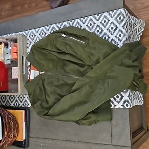 A green cropped sweater